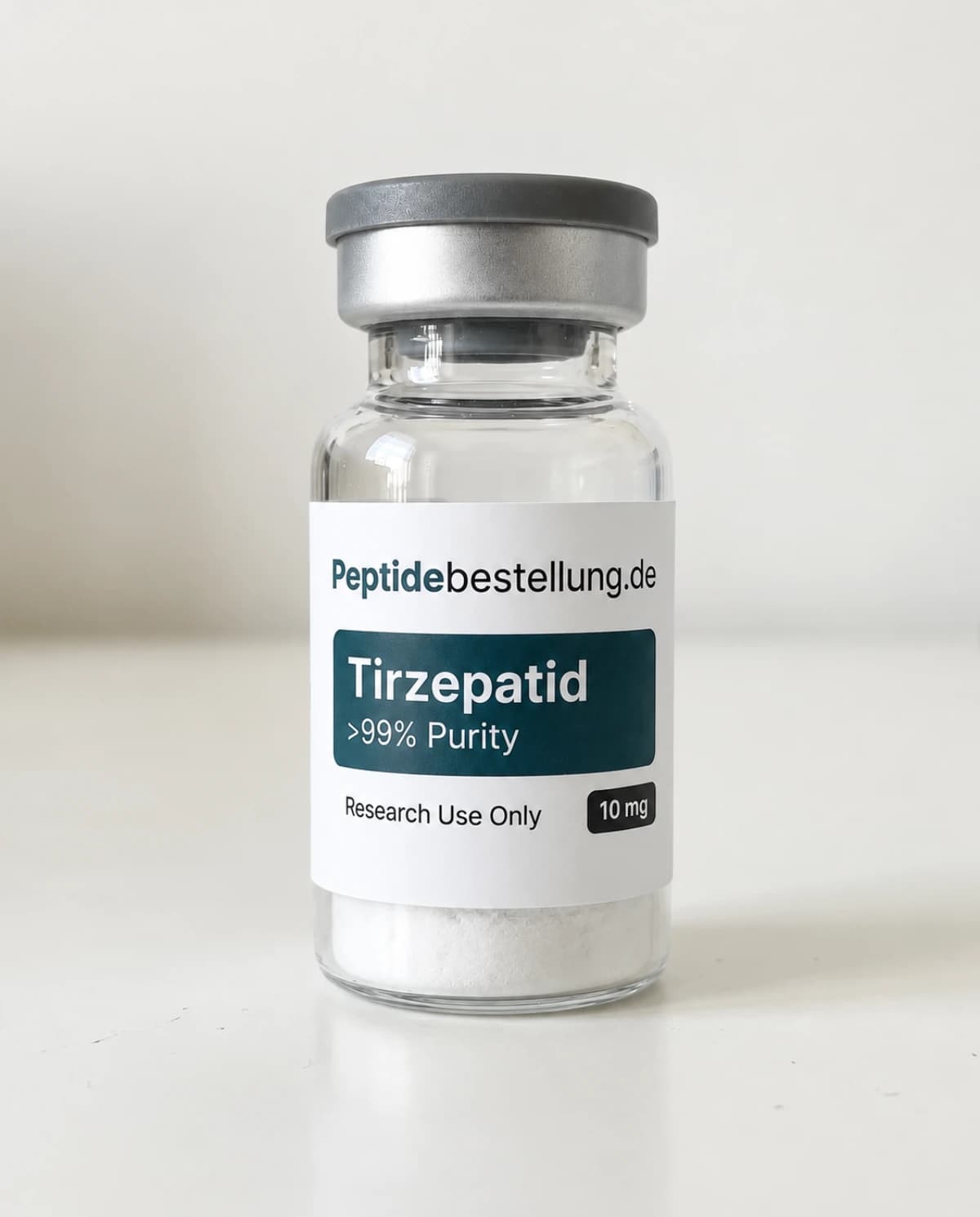 Tirzepatid 10 mg: einzelnes Glasvial mit Frontetikett und weißem trockenem Material